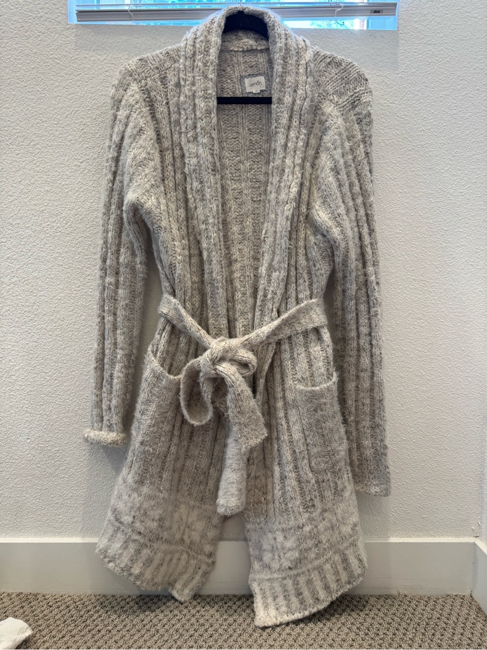 Lemon brand cardigan w/ a cozy, textured knit design wi/ detachable tie belt